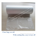 White plastic bags on roll with paper corn packing